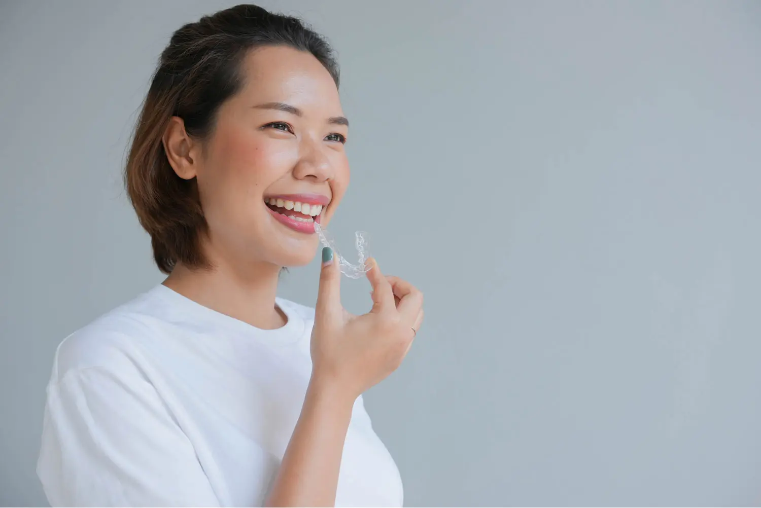 Woman With An Invisalign In Toluca Lake, CA